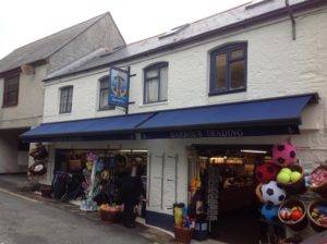 blue awning on shop in the high street