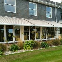 awning fitted to above windows on restaurant