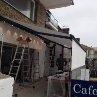 full awning installed on cafe